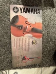 Yamaha EV-205 Electric String Violin Music Store Advertisement Counter Mat. Fixed Price $19.95.