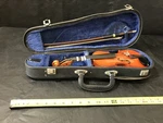 Violin Suzuki 1/16 With Case Pre-owned Child Sized. Fixed Price $200.00.