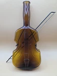 Vintage Violin Shaped Amber Glass Bottle Bow-style Wire Hanger 10. Fixed Price $75.00.