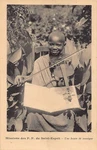 British East Africa - Young Boy Playing Violin Publ. Missions Of Fathe. Fixed Price $8.99.