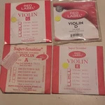 Super-sensitive Red Label Violin String Set 1/4 Stainless Steel Medium Gauge. Fixed Price $25.00.