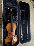 4/4 Eastman Strings VL100 Used Violin With Bows, Shoulder Rest, Rosin, And Tuner. Fixed Price $800.00.