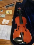 Violin W/ Case, Strings, Pitch Pipe, Bridges, & Bow Sku 72960 Made China. Fixed Price $47.00.