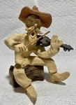 Vintage Clay Sculpture Signed By Tom Schoolcraft Cowboy Playing Fiddle On Stump. Fixed Price $29.99.
