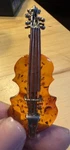 Baltic Amber Intricately Detailed Violin Broach/pin. Fixed Price $45.00.